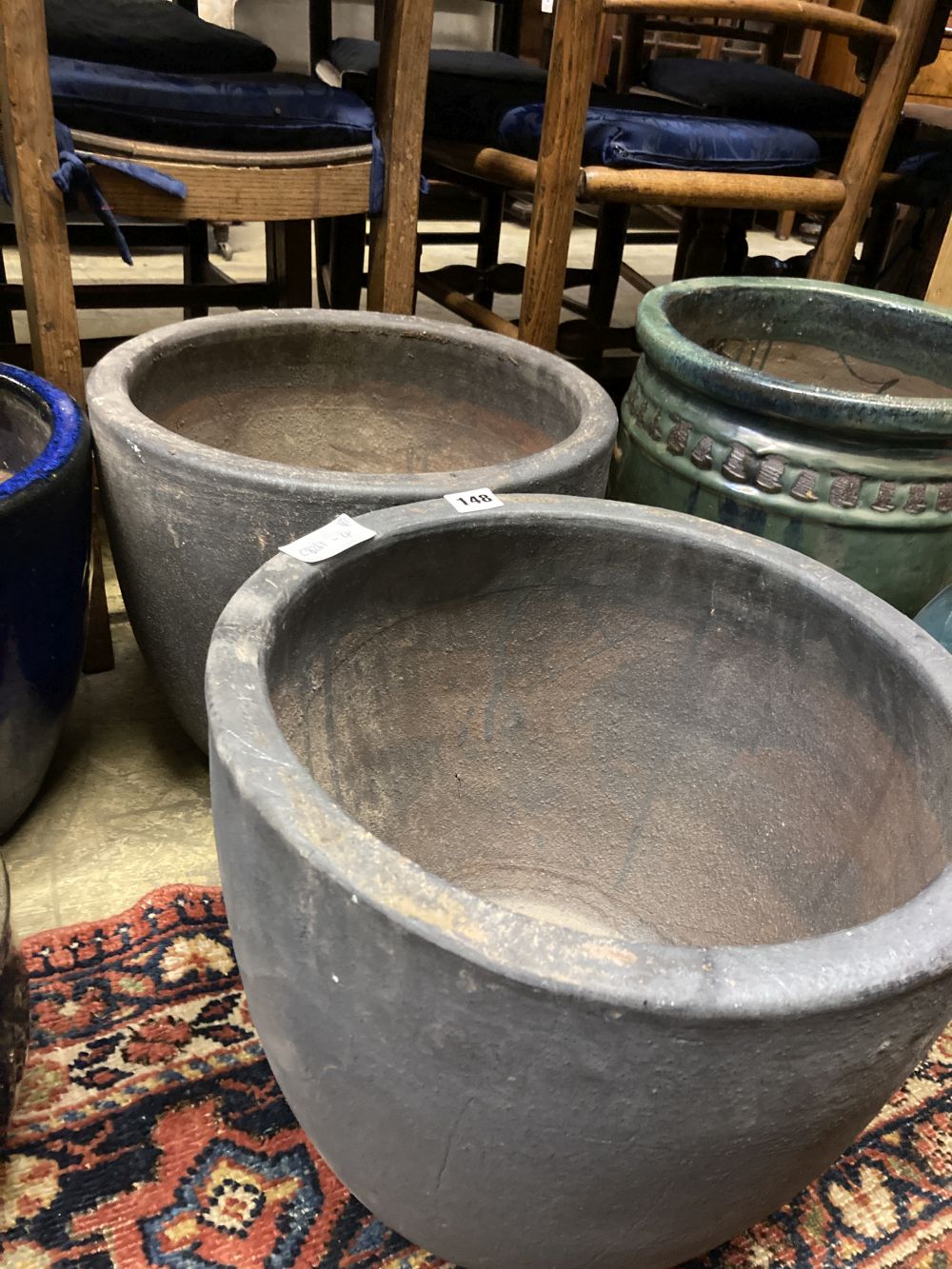 A pair of glazed earthenware garden planters, diameter 38cm